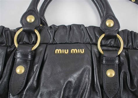 Leather handbag Miu Miu Black in Leather 